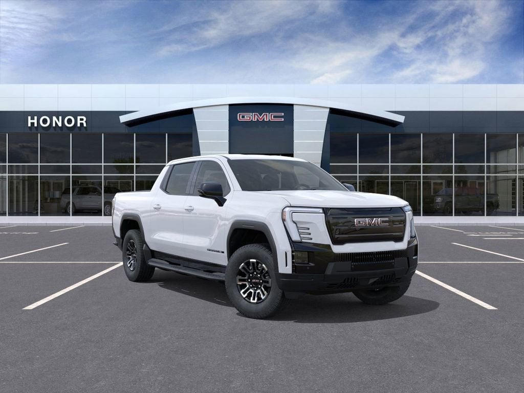2026 GMC Sierra EV Elevation Standard Range in Summit White — front three-quarter view