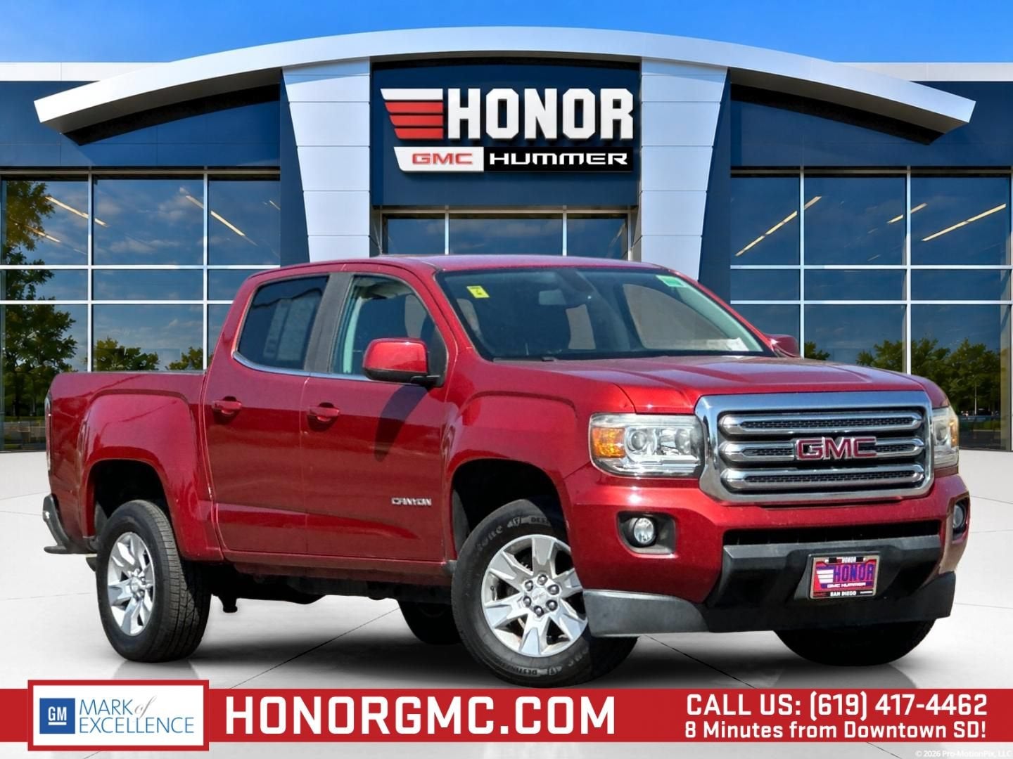 2016 GMC Canyon 2WD SLE in Copper Red Metallic — front three-quarter view