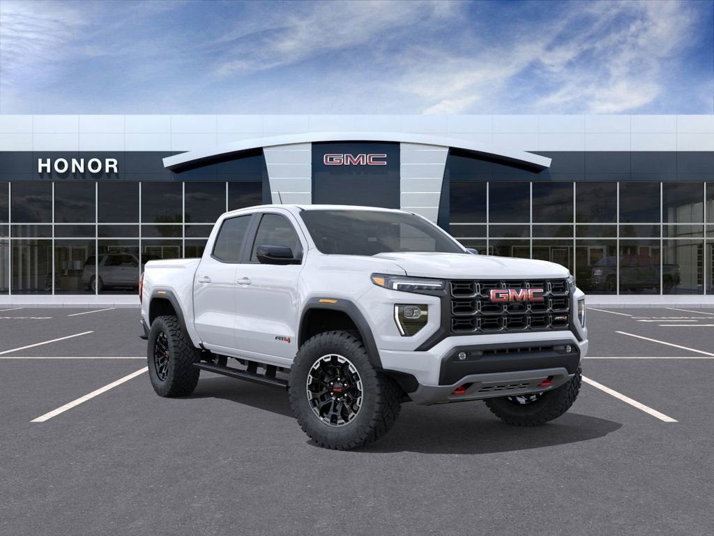 2026 GMC Canyon AT4 in Summit White — front three-quarter view