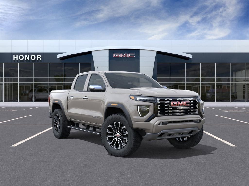 2026 GMC Canyon Denali in Coastal Dune — front three-quarter view
