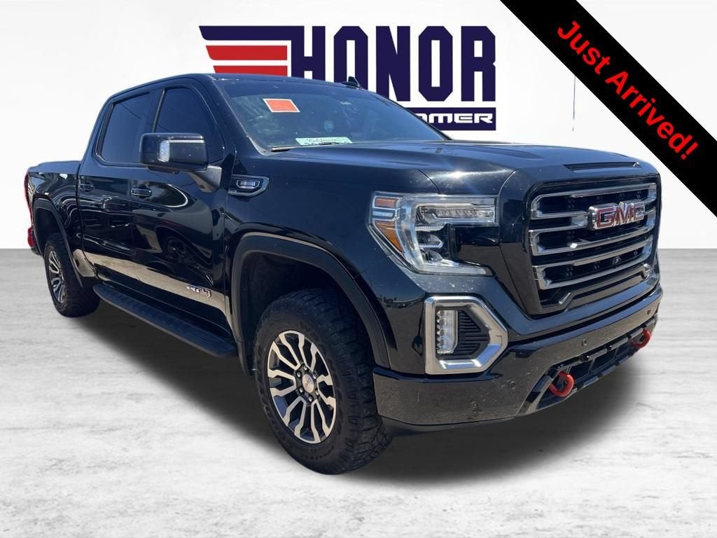2021 GMC Sierra 1500 AT4 in Onyx Black — front three-quarter view
