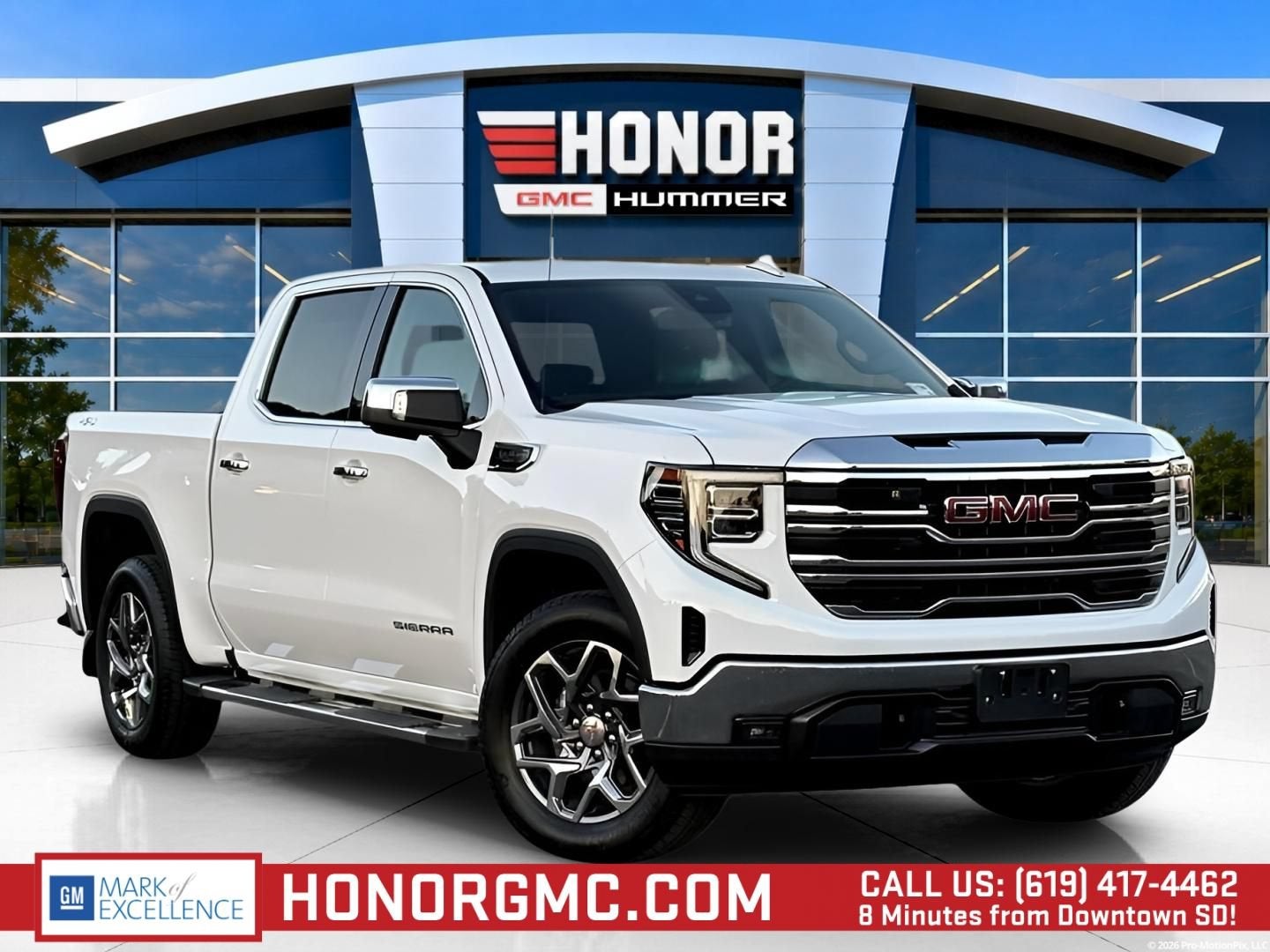 2026 GMC Sierra 1500 SLT in Summit White — front three-quarter view