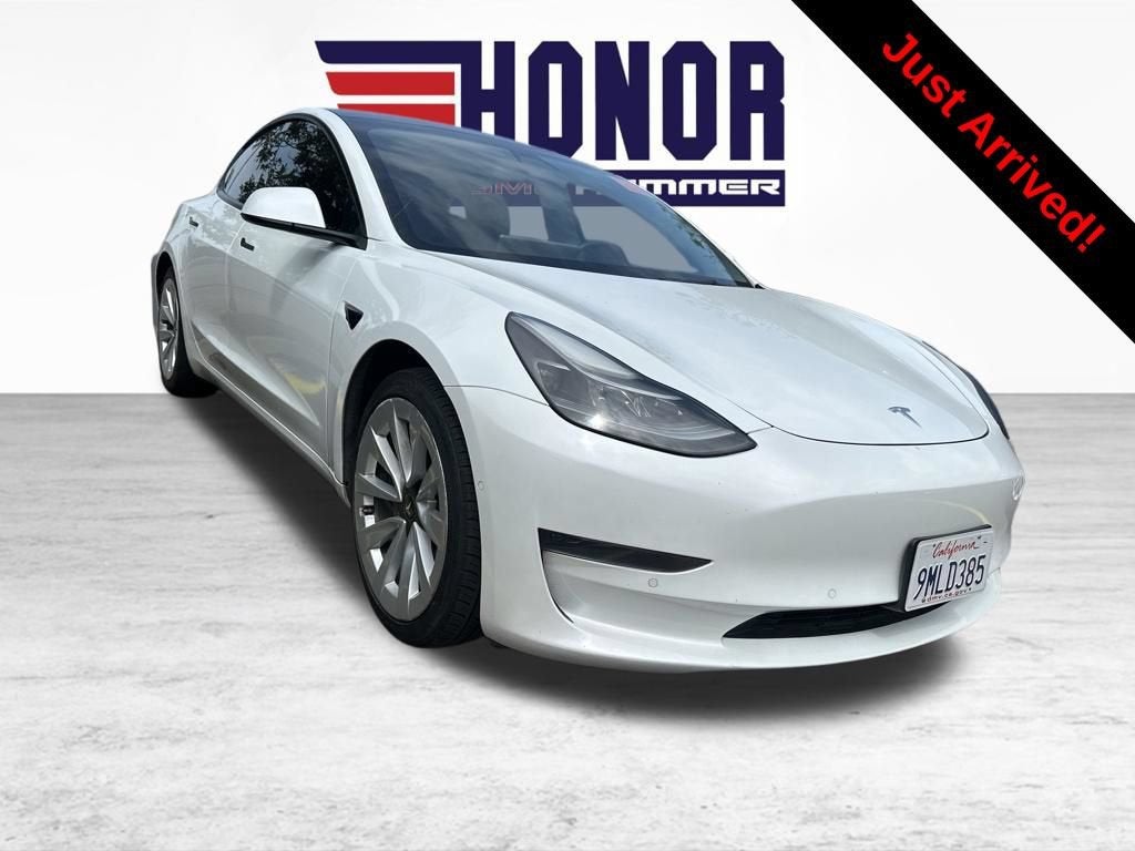 2022 Tesla Model 3 RWD in White — front three-quarter view
